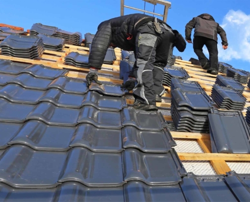 tile roof being installed