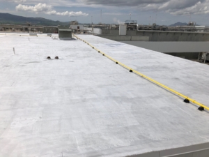 flat roof with mountains in the background