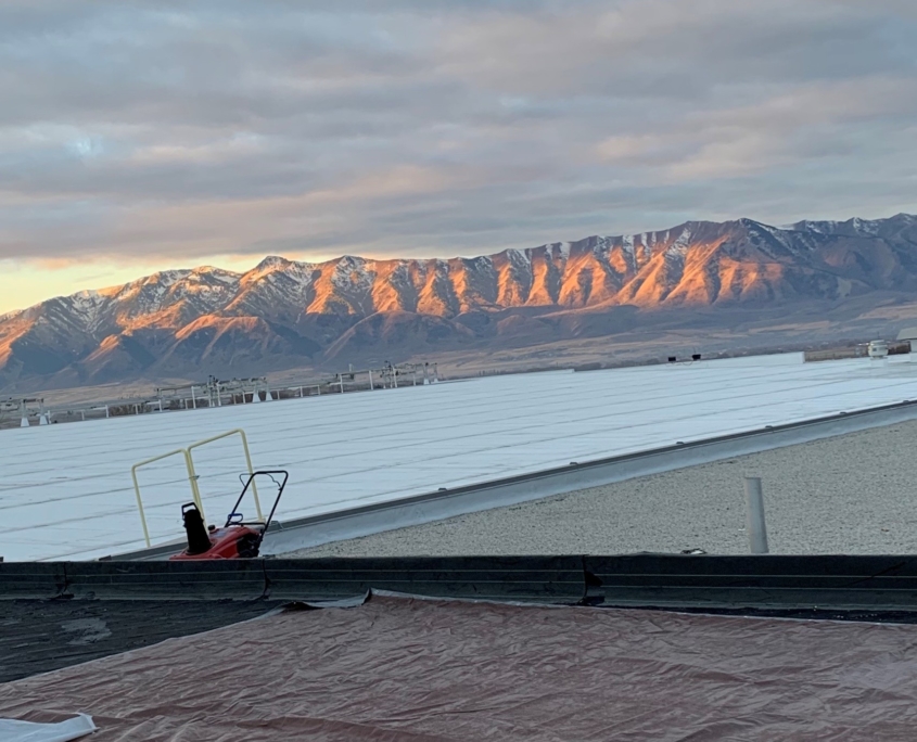 flat roof with mountains in the background