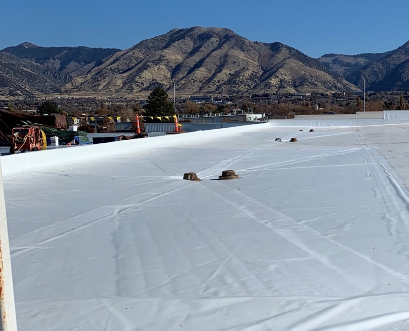 flat roof with mountains in the background