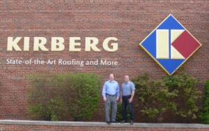 kirberg owners in front of the kirberg building