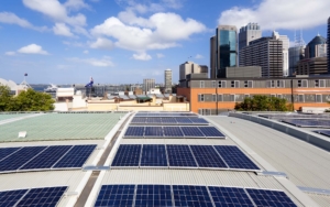 Commercial solar panels on top of a building in the city